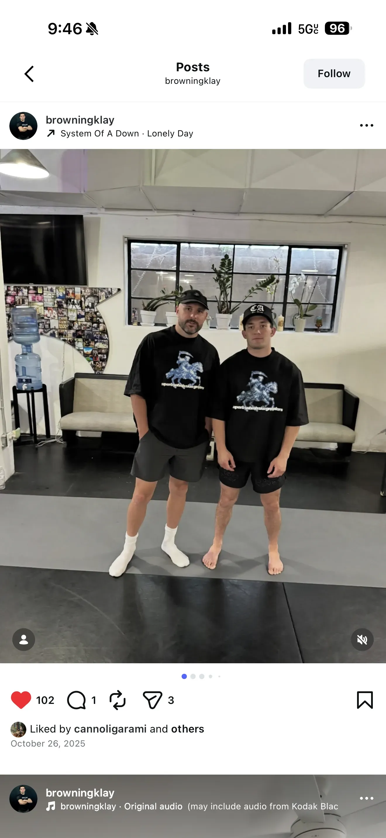 No-gi class partners working through an exchange from standing.